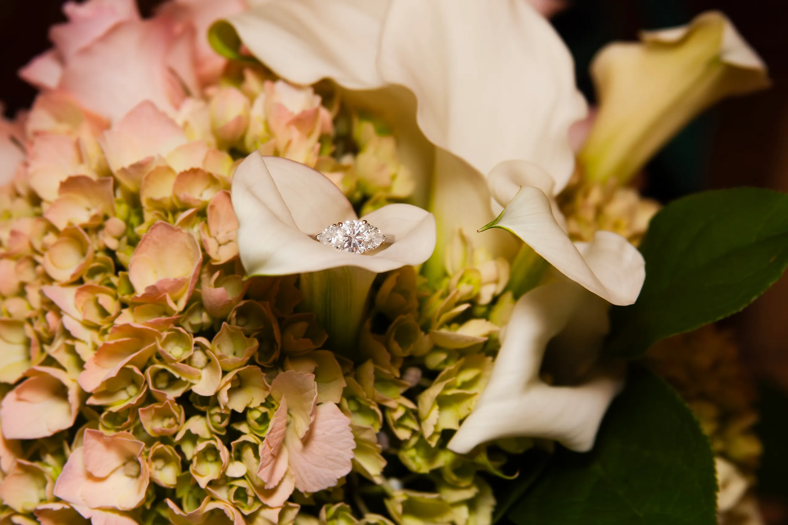 Wedding ring and bouquet detail